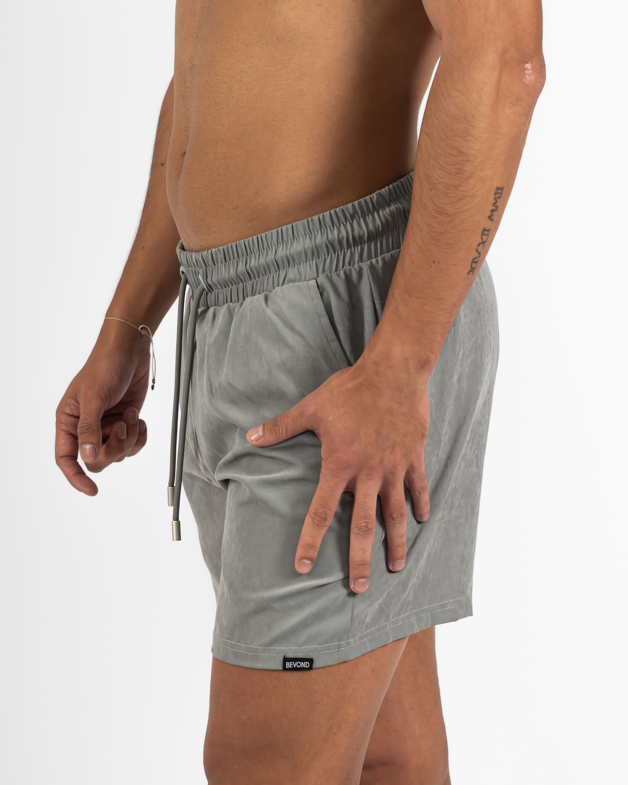 GREY WATER-REACTIVE SWIM SHORTS - BEVOND™