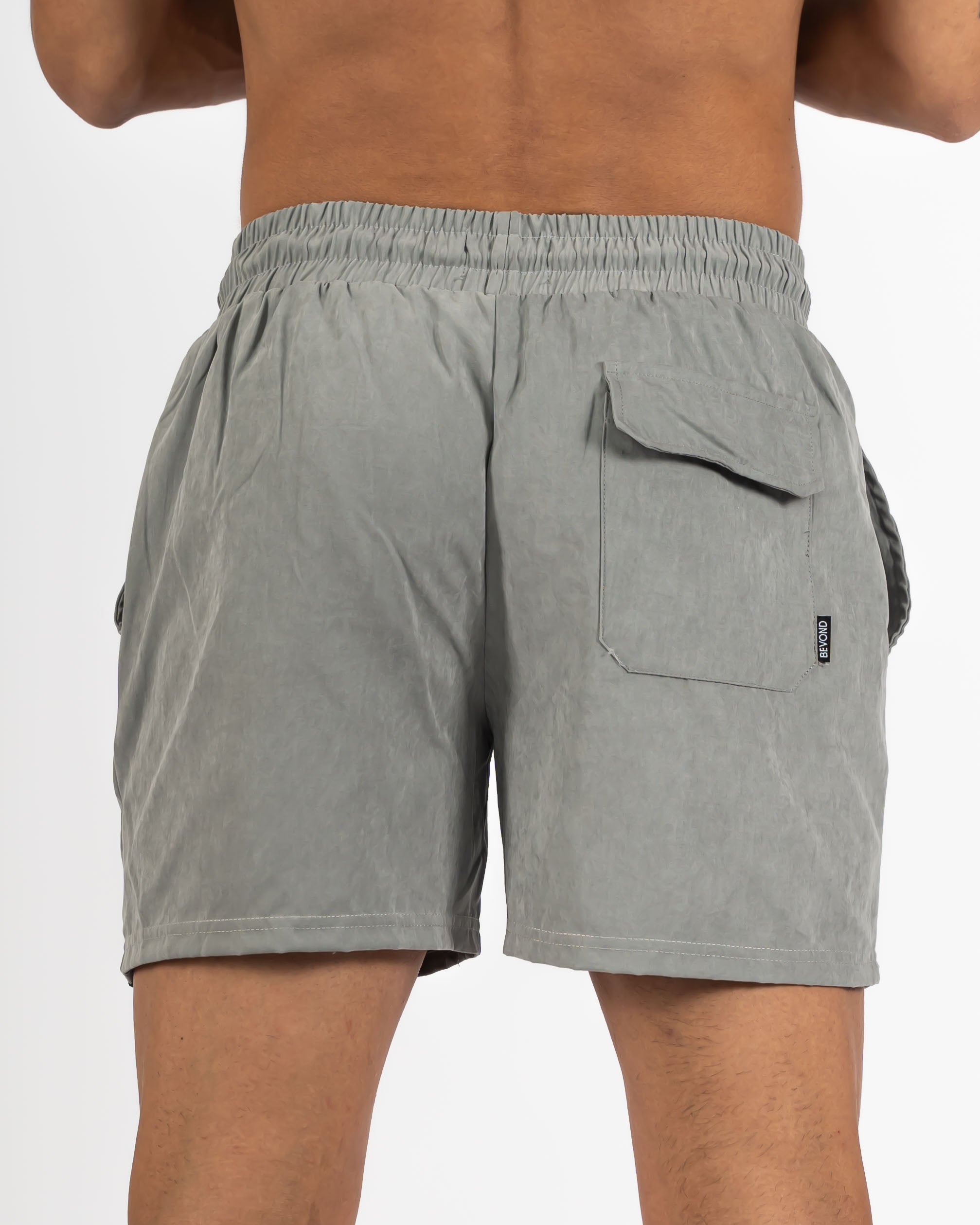 GREY WATER-REACTIVE SWIM SHORTS - BEVOND™